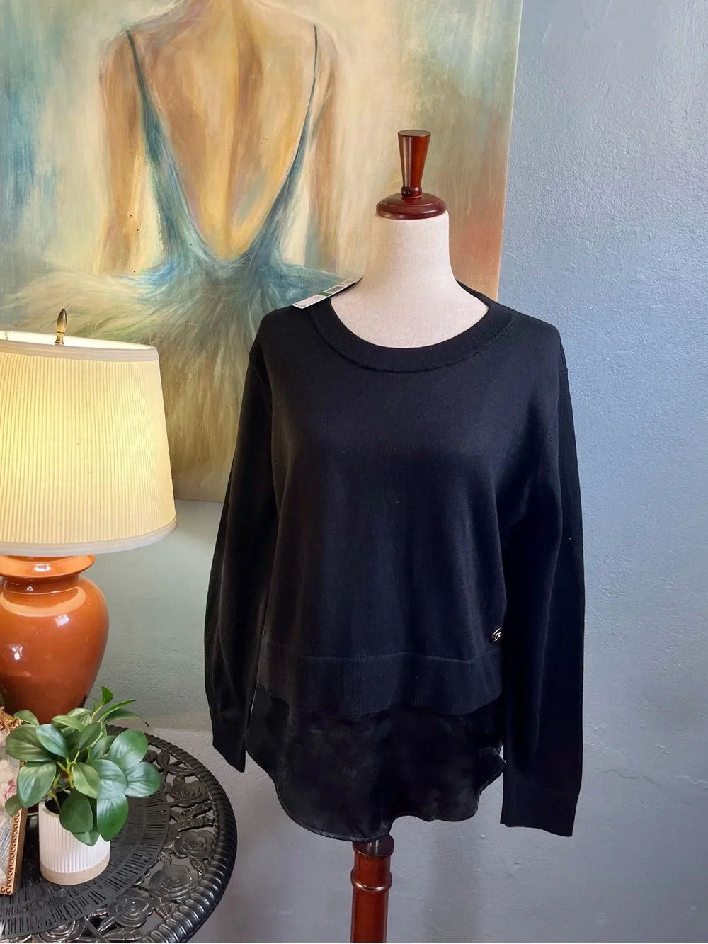 New w/tags, Michael Kors top w/silky shirt tail in black. Size L w/gold logo.